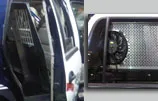 Paired shots of window bars on an open rear door and a K9 kennel cooling fan mounted behind mesh