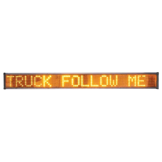 Bare 40-inch sign lit with the message TRUCK FOLLOW ME in amber block letters