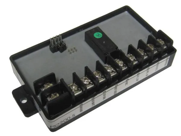 D&R FS2200-S headlight flasher module with nine barrier screw terminals and the part number on the case