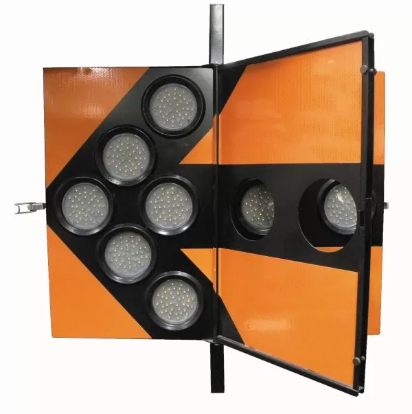 Arrowboard with one panel hinged open, showing the folding frame and the empty lamp cut-outs
