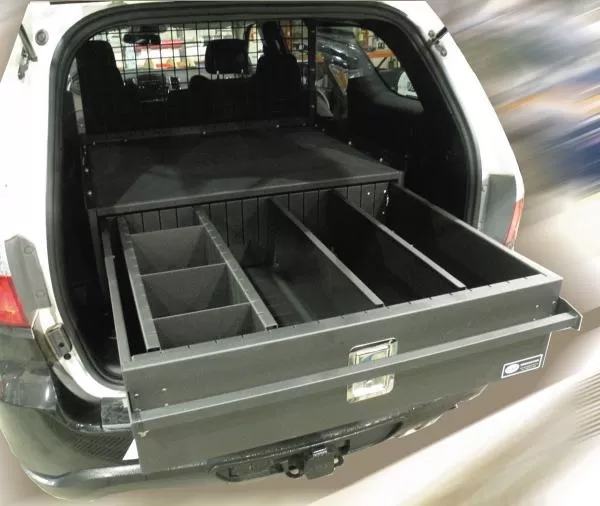 Drawer pulled fully open showing adjustable dividers splitting the tray into separate compartments