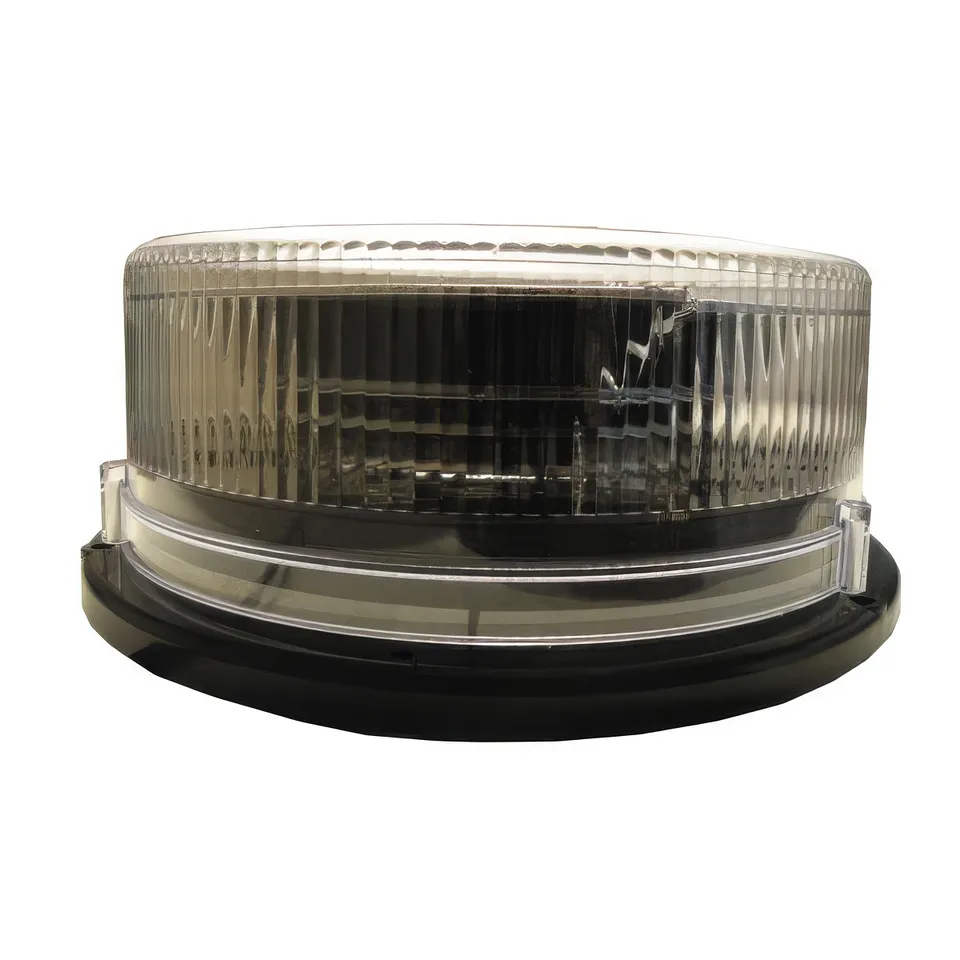 Clear-lens beacon with the internal LED array and reflector visible through the fluted dome