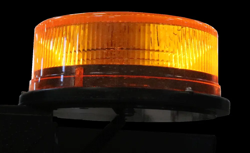 D&R BCN24 LED beacon with a red fluted polycarbonate lens on a low-profile black base