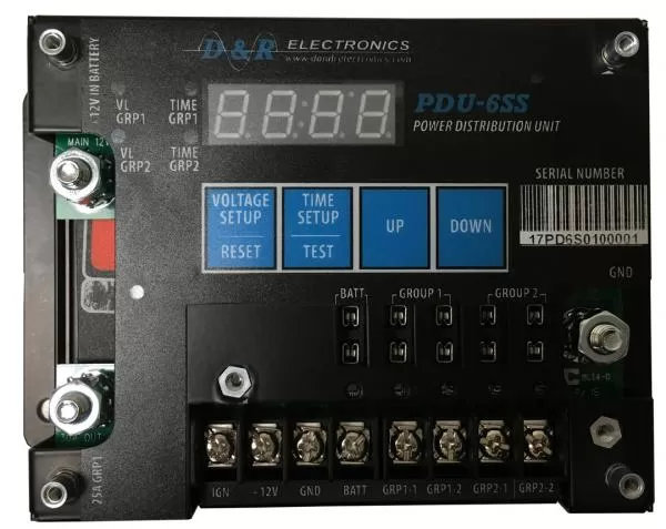 Faceplate with the cover off: voltage and time setup keys, fuse bank and IGN, GND, BATT terminal screws