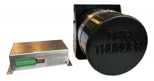 D&R Thunder-1 low frequency siren amplifier beside the round Thunder speaker with embossed cover