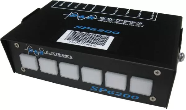 Top of the black case showing the printed output legend and the serial barcode on the lid