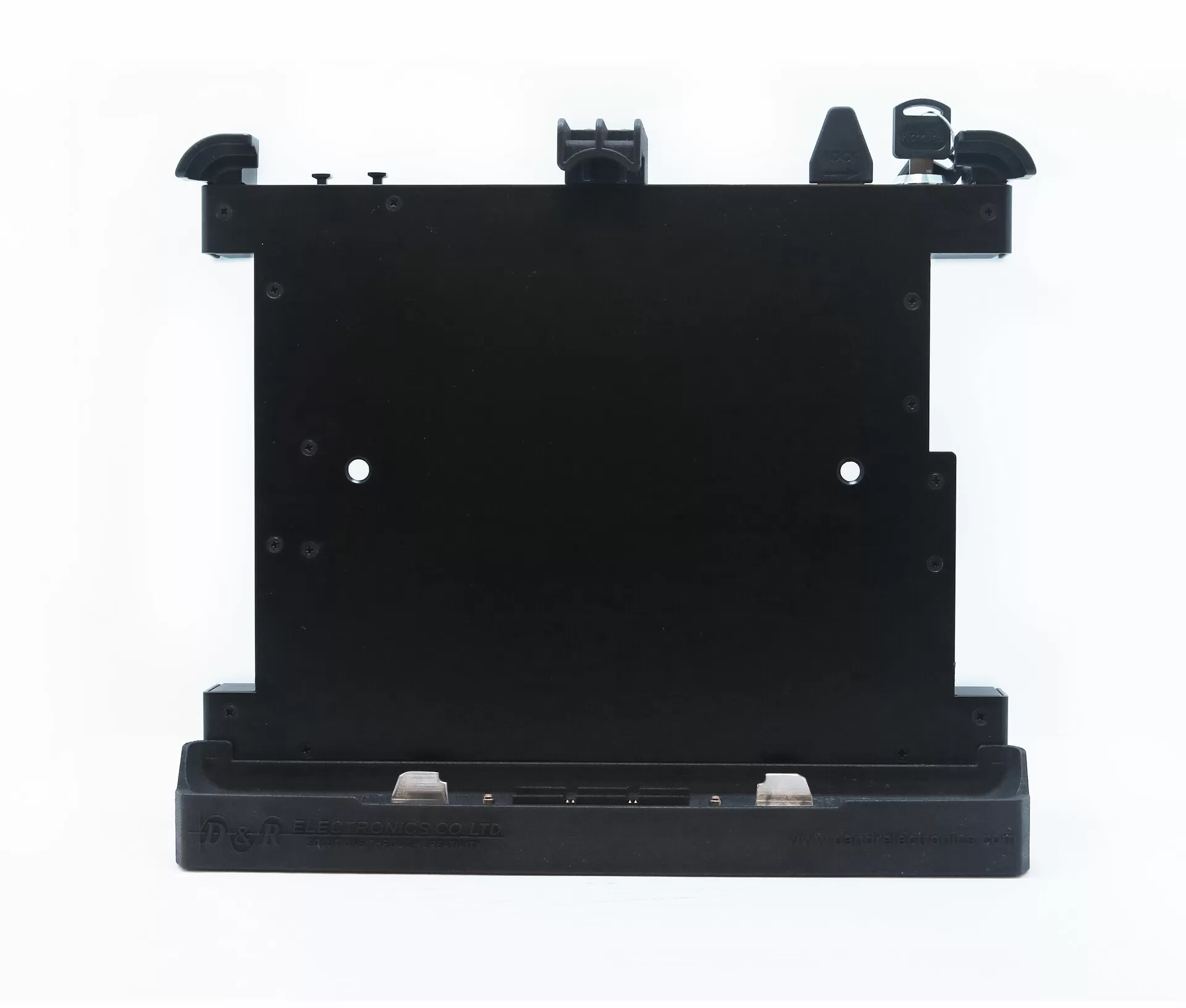 Front of the bare dock: flat tablet plate, top retaining clips, key in the lock and base connector