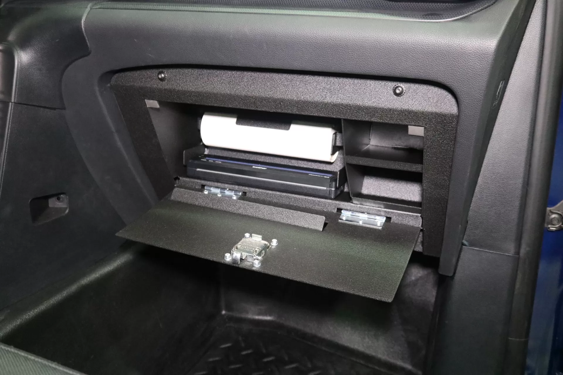 D&R 918-0051A glove box printer mount holding a Brother printer and paper roll, door dropped open