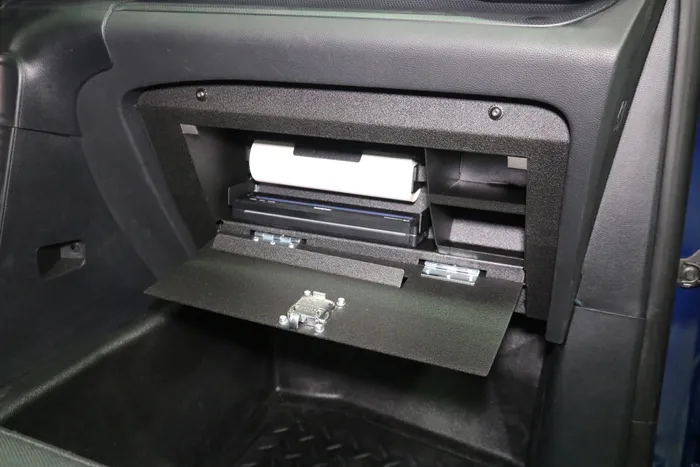 D&R 918-0051A glove box printer mount holding a Brother printer and paper roll, door dropped open