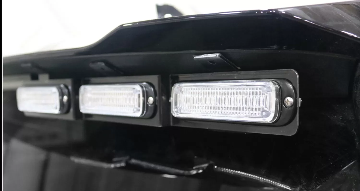 D&R GT2FTL-PIC-EXP20 exterior lightbar close-up, three clear-lens LED modules along the rear spoiler edge
