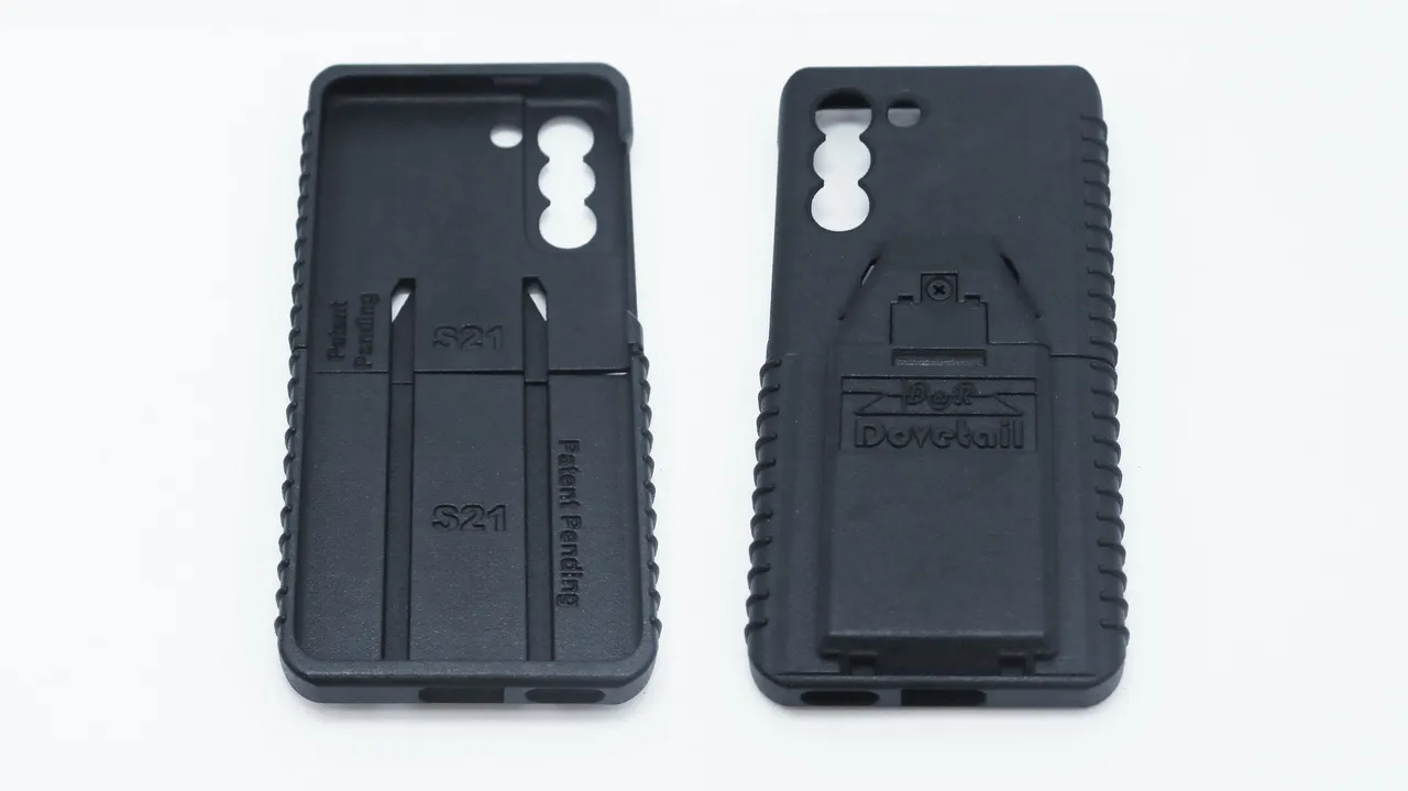 Both case halves side by side, inner face marked S21 and Patent Pending, outer face D&R Dovetail