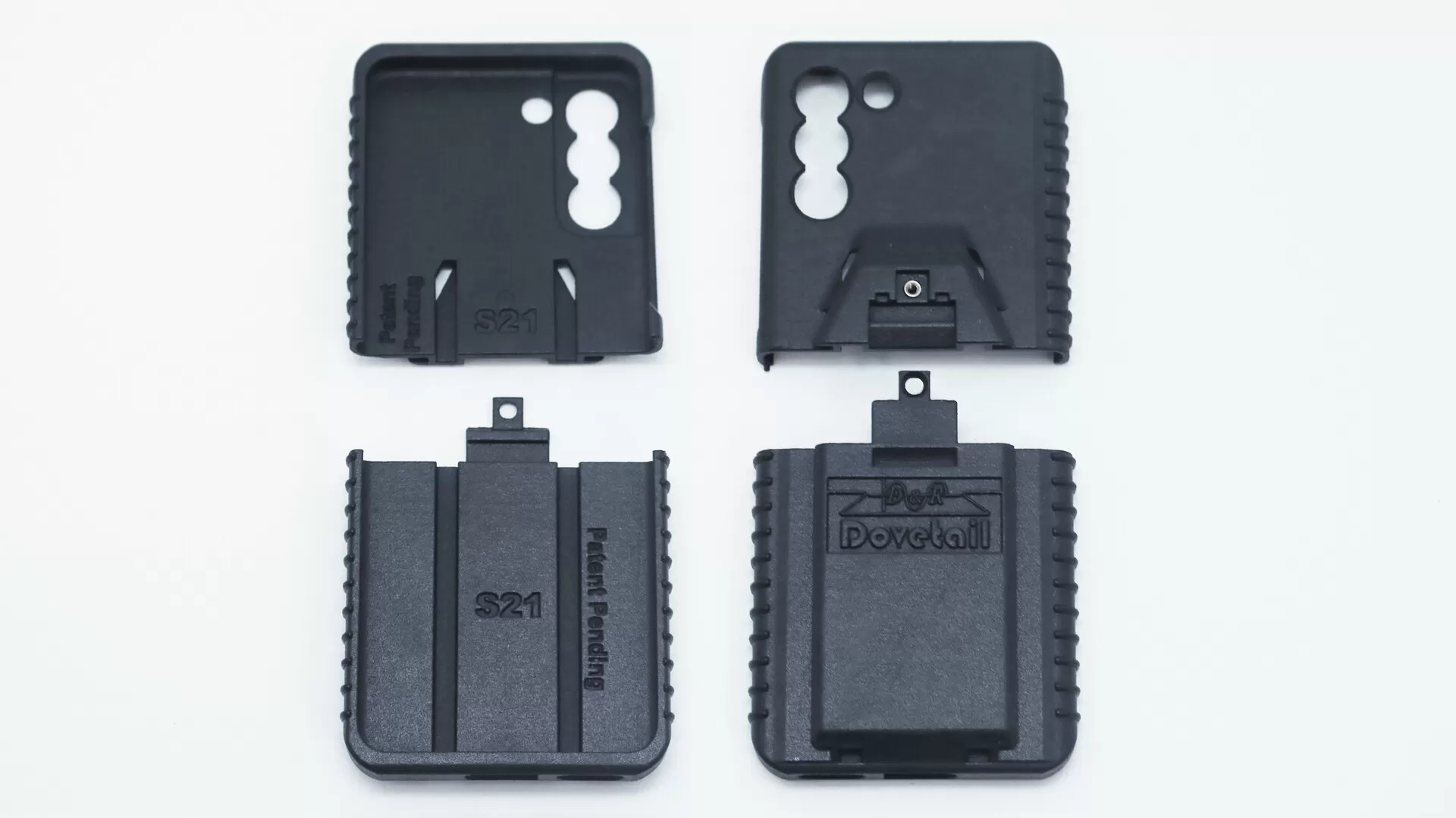 Four moulded case parts laid out flat, inner faces marked S21 beside the logo-stamped outer backs