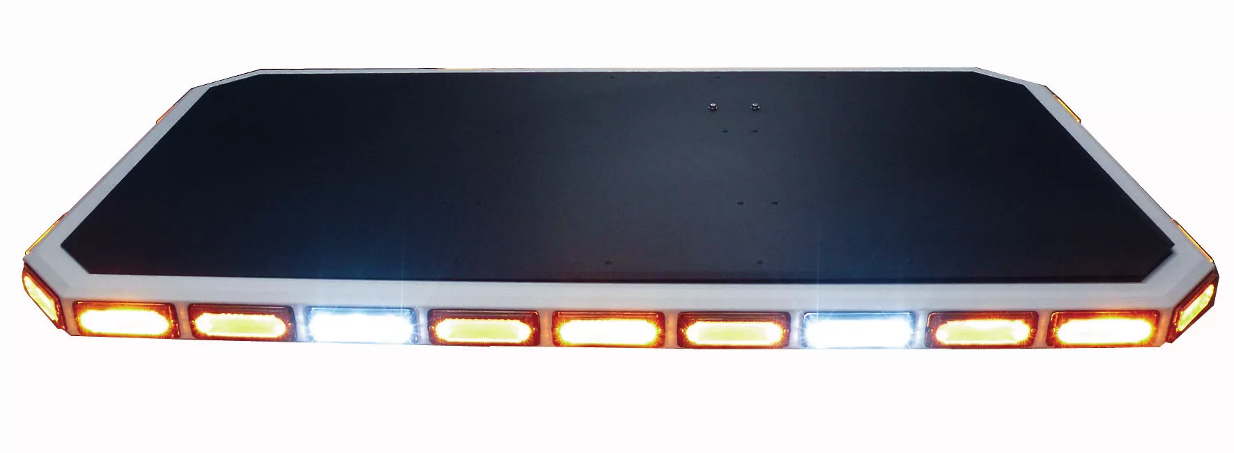 Front of the low-profile lightbar on its own, amber and white modules lit along the clear lens