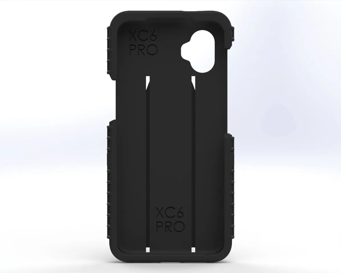 Inside of the two-piece case with XC6 PRO molded at the top and bottom of the phone cavity
