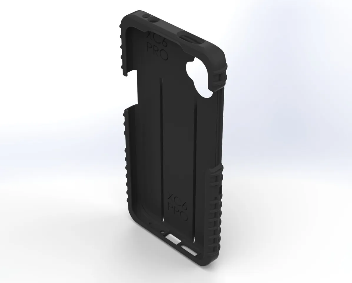Empty case shell tilted to show XC6 PRO molded inside the phone cavity and the lens opening