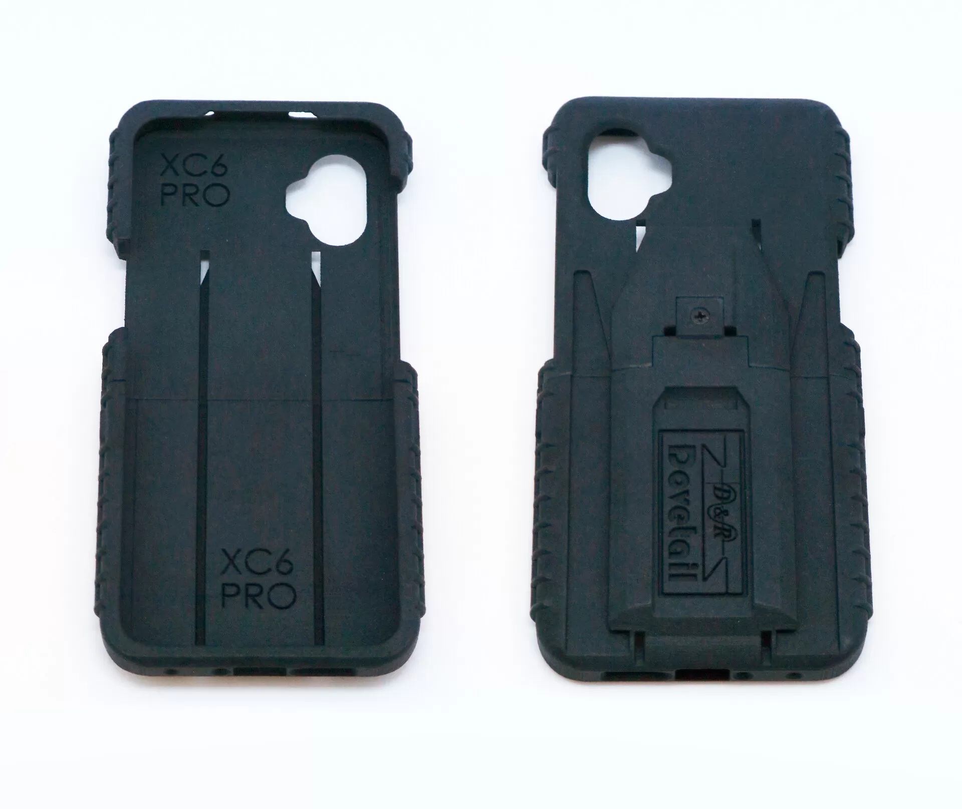 Case halves side by side, ribbed interior at left and the Dovetail dock face at right
