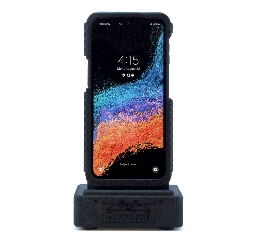 D&R Dovetail desktop docking station, front view of the empty phone cradle above the embossed logo base