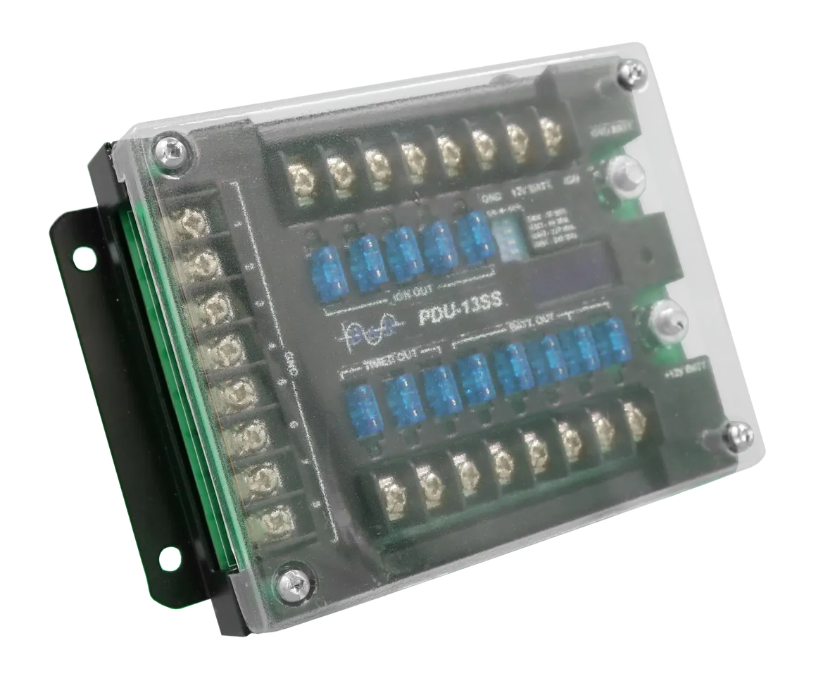 Clear cover over the fuse rows, with the GND BATT. and +12V BATT. stud posts at the right side
