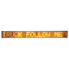 Bare 40-inch sign lit with the message TRUCK FOLLOW ME in amber block letters