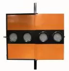 Opposite face of the arrowboard, four amber lamps set in a black band across the orange panels