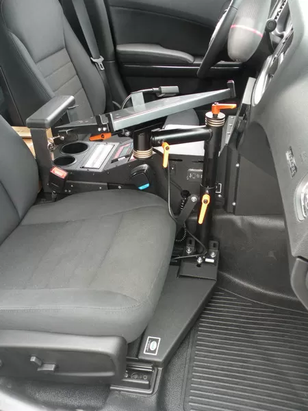 D&R LT6600 mounting kit for the Dodge Charger installed beside the console with orange lock handles