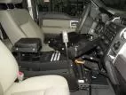 D&R SRCSUV 18" sloped emergency vehicle console fitted between the front seats with armrest and cup holders