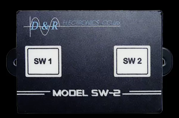 D&R SW-2 dual switch module with backlit SW 1 and SW 2 buttons on a black anti-spill LEXAN front