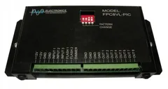 D&R FPC8VL-PIC interior lightbar flasher, top view with red DIP switch and green terminal blocks