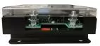 End view showing the heavy battery input studs, internal circuit board and black mounting flange