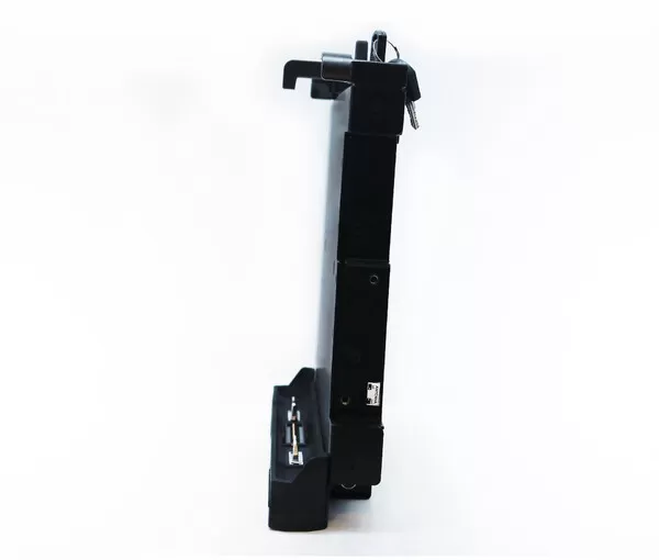 Narrow side profile with the key standing out of the lock at the top and the connector at the foot