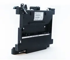 Rear angle from the left showing the MODEM 1 pass-through connector at the base and the key in the lock