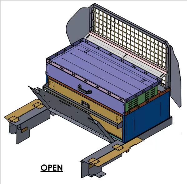 Frame shown carrying a cabinet with the drawer in the OPEN position under a mesh cargo partition