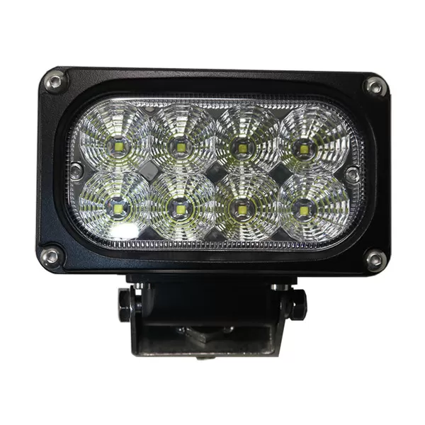 Straight-on view of the rectangular lamp face with eight LEDs set in faceted clear optics