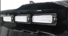 D&R GT2FTL-PIC-EXP20 exterior lightbar close-up, three clear-lens LED modules along the rear spoiler edge