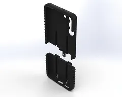 Interior side of the two parts pulled apart, showing the tongue that joins shell to base