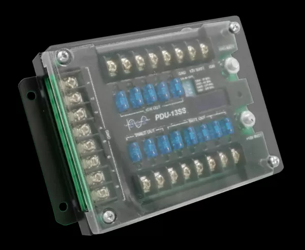 Clear cover over the fuse rows, with the GND BATT. and +12V BATT. stud posts at the right side